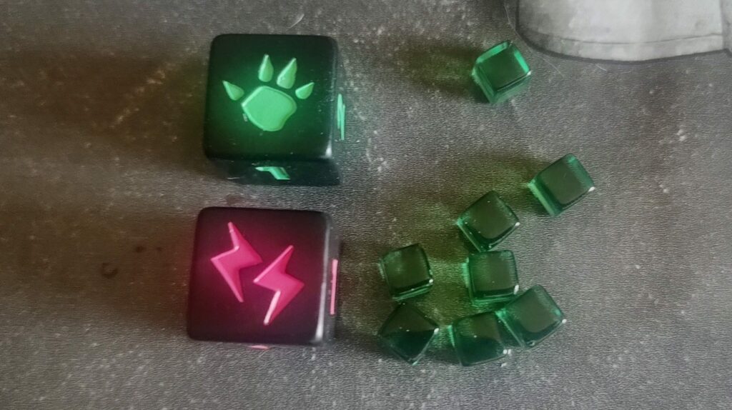 Les dés et les cubes de King Of Tokyo dans Mindbug